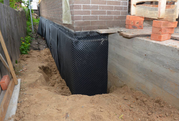 SJ Waterproofing Pros technician performing targeted Emergency Waterproofing assessment in Collegeville, PA
